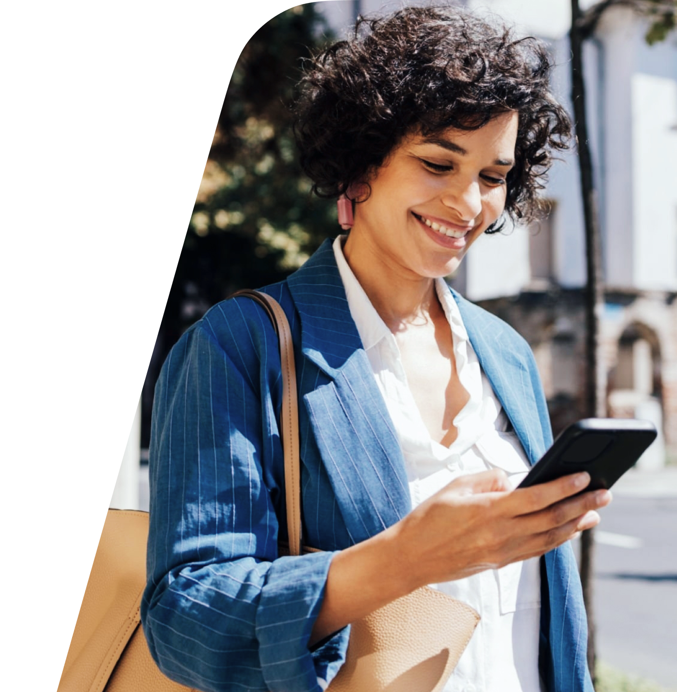 Smiling customer checking her transfer on a mobile phone